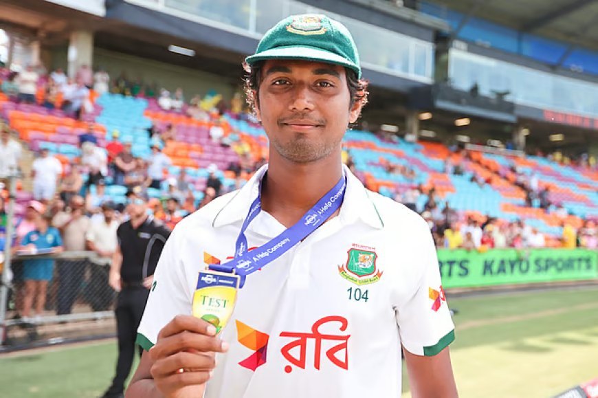 Hasan Mahmud with the Player of the Match award.