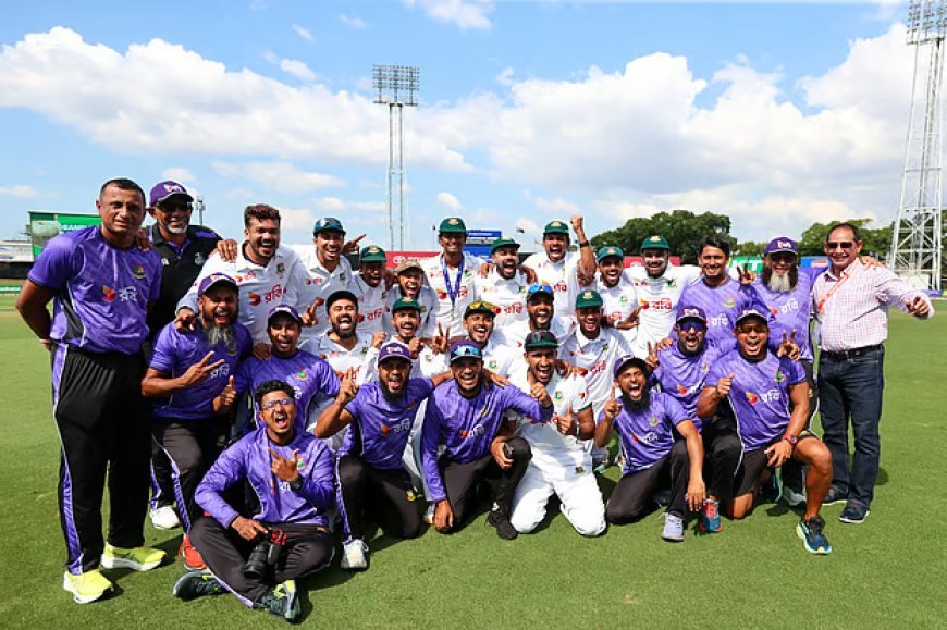 Bangladesh cricketers, along with the coaching staff, during a photo session after defeating Australia.